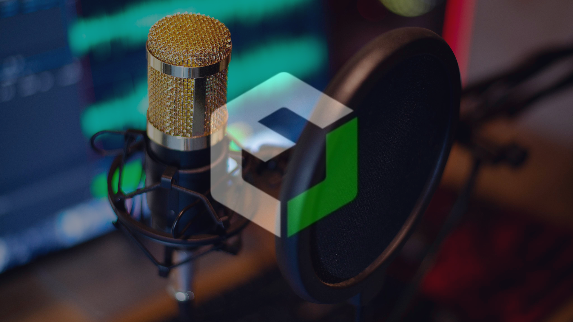Podcast equipment on a desk with a Orchestrate AMS logo overlay.